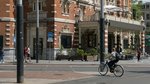 woman riding a bicycle in Amsterdam, Netherlands